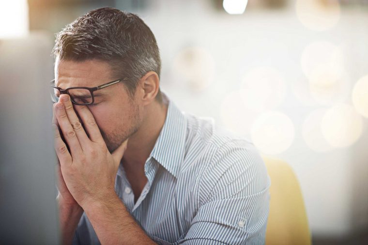 say no to sex exhausted|Overwhelmed man with his head in his hands|Man turned away from woman in bed|Older man talking with his doctor|Stressed man putting his hands to his face|Man sound asleep with woman watching him|Woman kissing man in bed