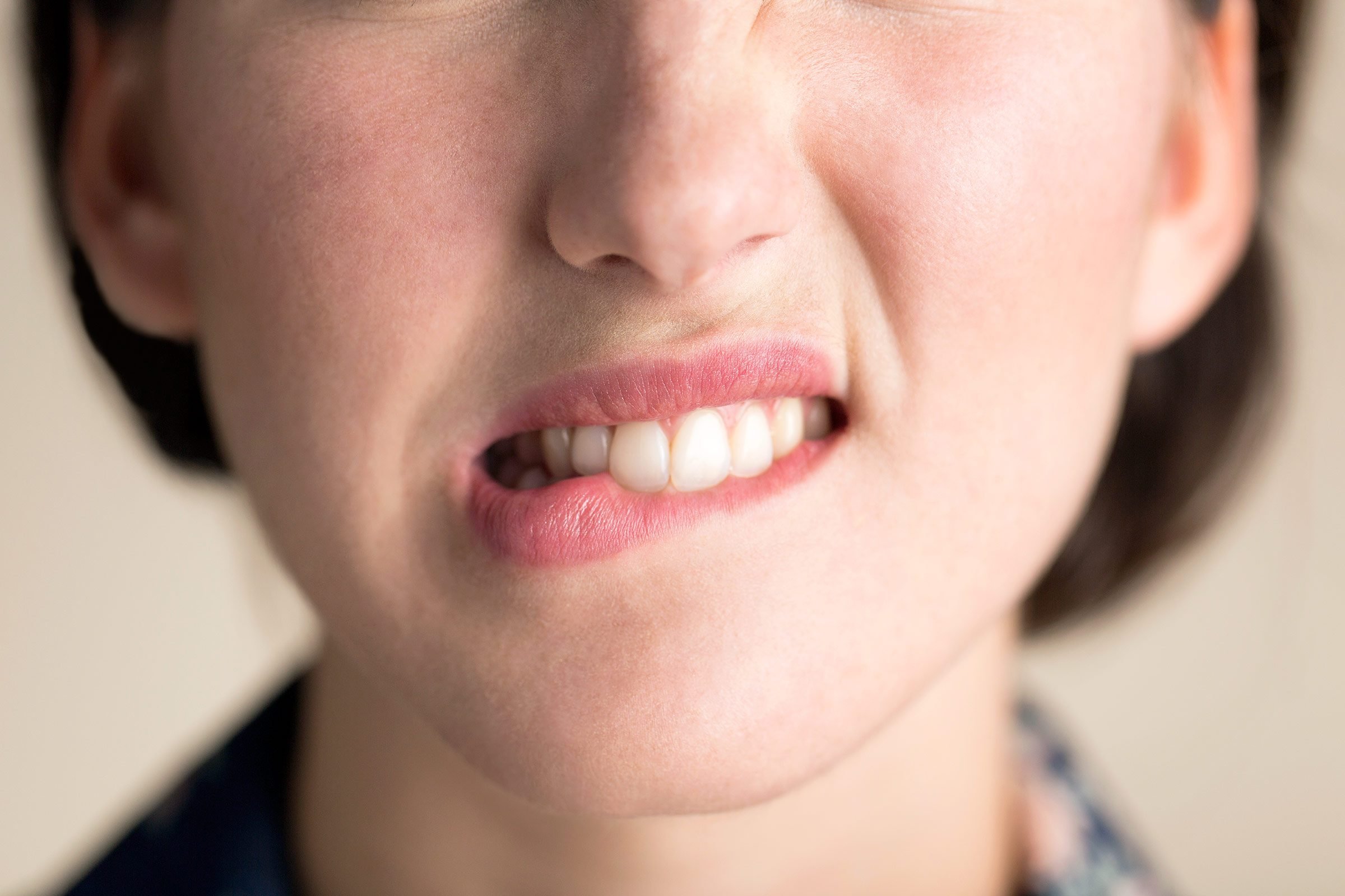 pap smear test woman worried biting lip