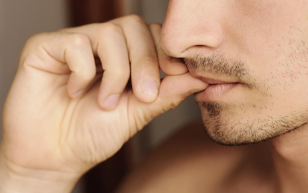 What Your Nail Biting Habit Really Says About Your Personality