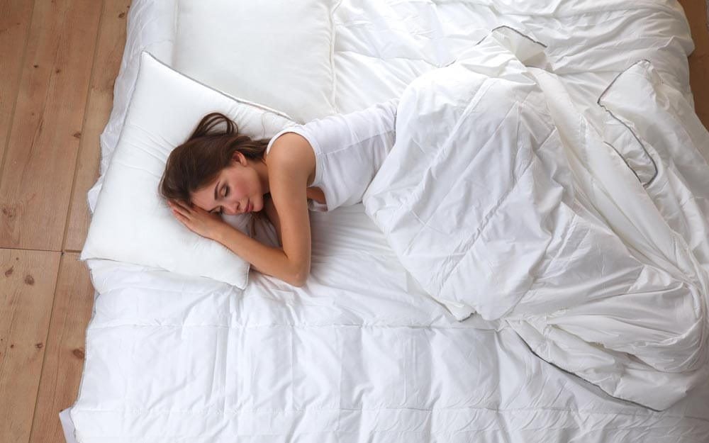 The 2 Best Sleeping Positions for Your Health, According to Science