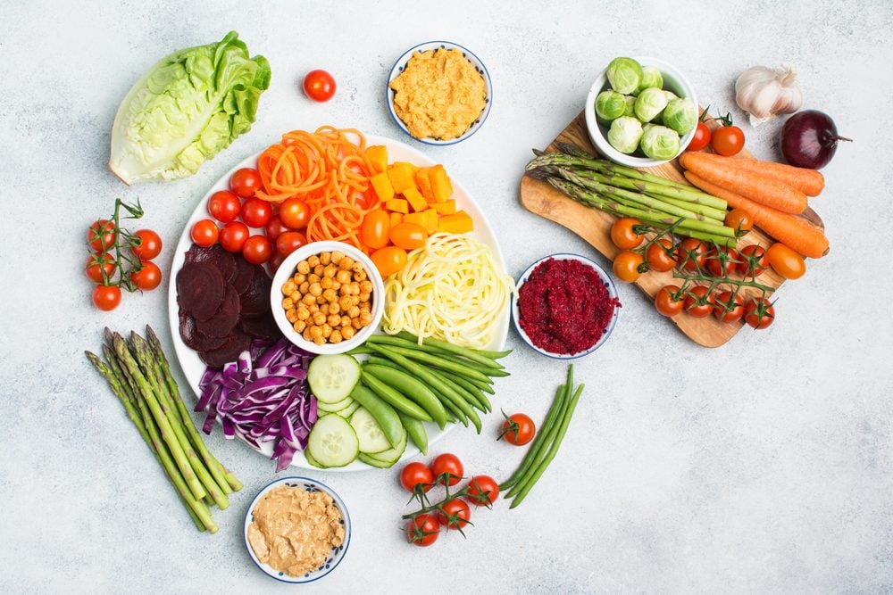 Vegan salad, top view of buddha bowl, colourful vegetables, carrot, courgette, cabbage, chickpeas, cucumber and tomatoes, on wooden board on white table, copy space, top view, selective focus|Vegan salad, top view of buddha bowl, colourful vegetables, carrot, courgette, cabbage, chickpeas, cucumber and tomatoes, on wooden board on white table, copy space, top view, selective focus|Healthy strawberry fruit flavored yogurt with natural coloring in plastic cup isolated on white rustic background with little silver spoon - top view shot in studio|Fresh Soybean / Peeled Soybean|Almond milk in glass with nuts isolated on white background|Vegetables and salad dressings|Sandwich with ham,   cheese, tomatoes, lettuce, and toasted bread. Top view isolated on white background.|Group of open canned vegetables shot from a high angle. Assorted veggies carrots, corn, green beans, peas and mixed vegetables.|Raw tuna fish fillet meat on wooden cutting board with vegetable and ingredient for cooking|Granola background close-up|Different dried fruits background