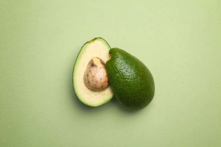 Avocado cut in half.