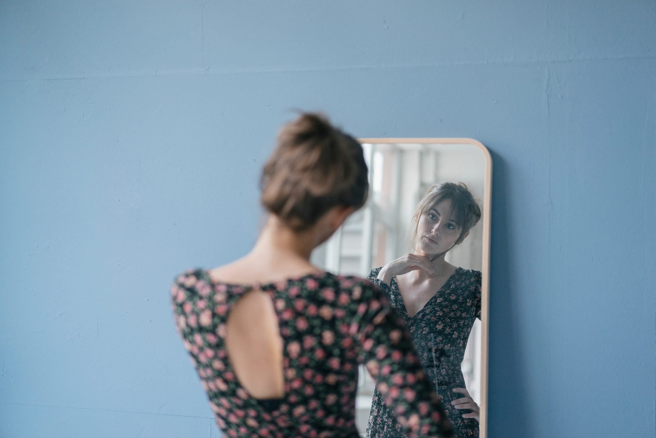 woman looking at myself in mirror