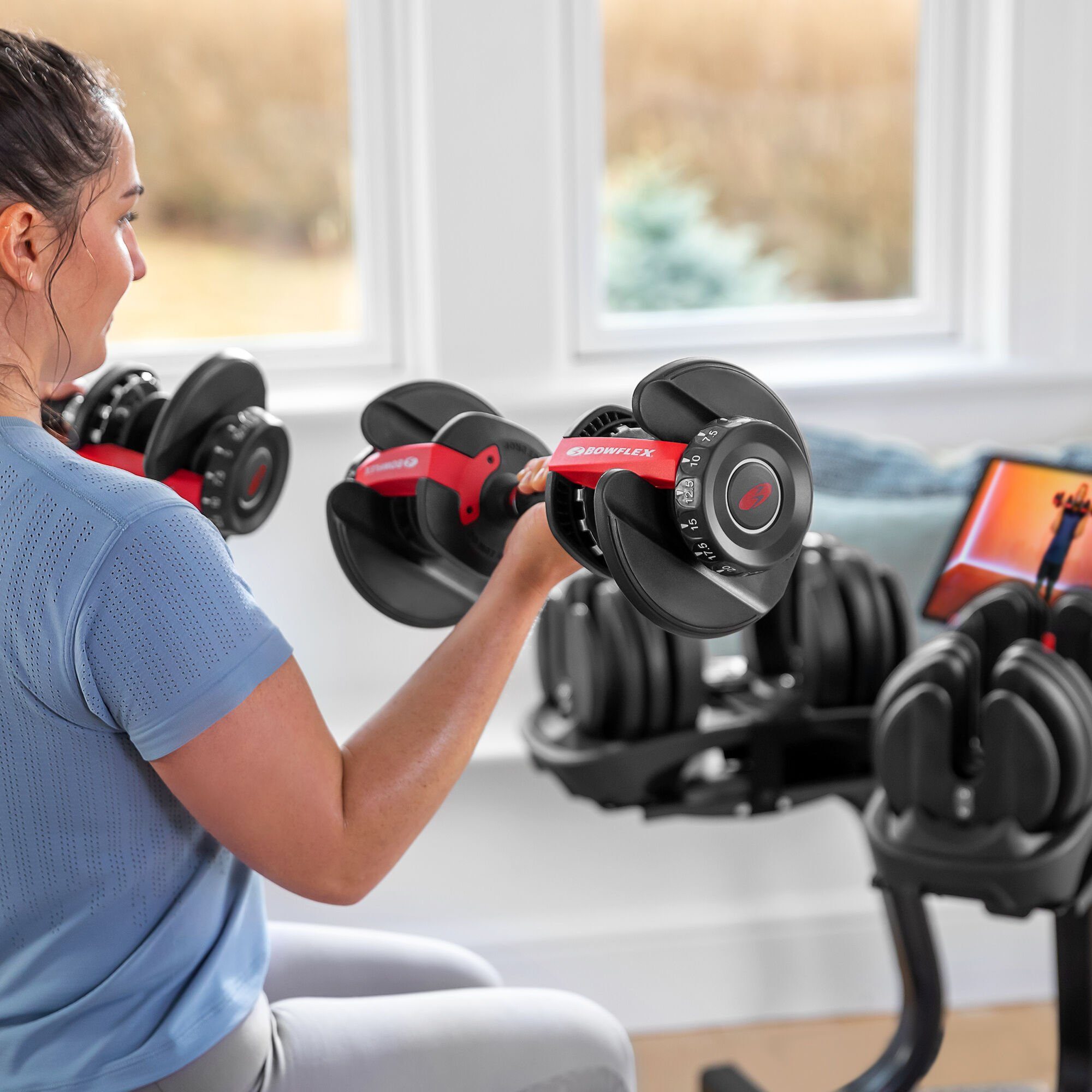 A Trainer Says These Adjustable Dumbbells Are Your "Best Investment"
