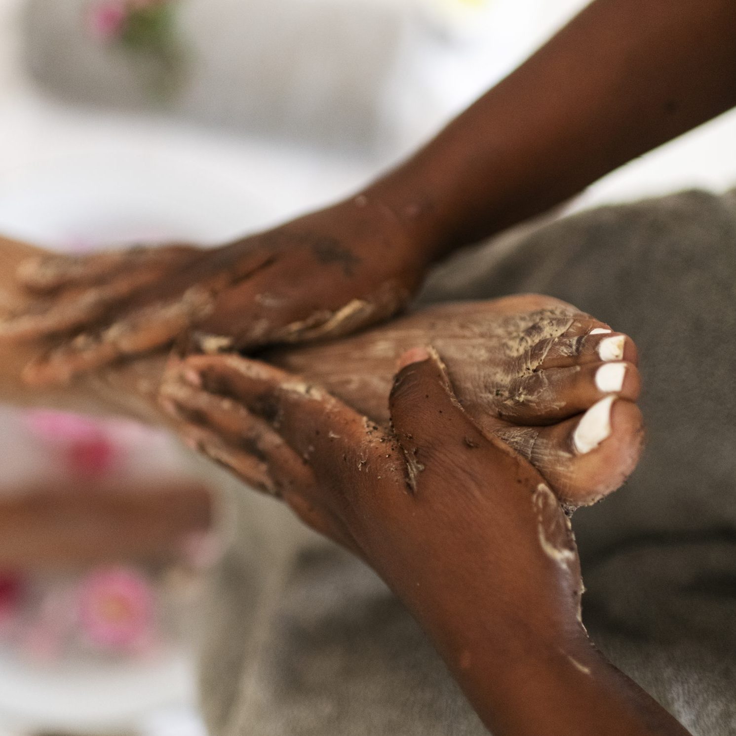 hands exfoliating feet in a spa|hands exfoliating feet in a spa