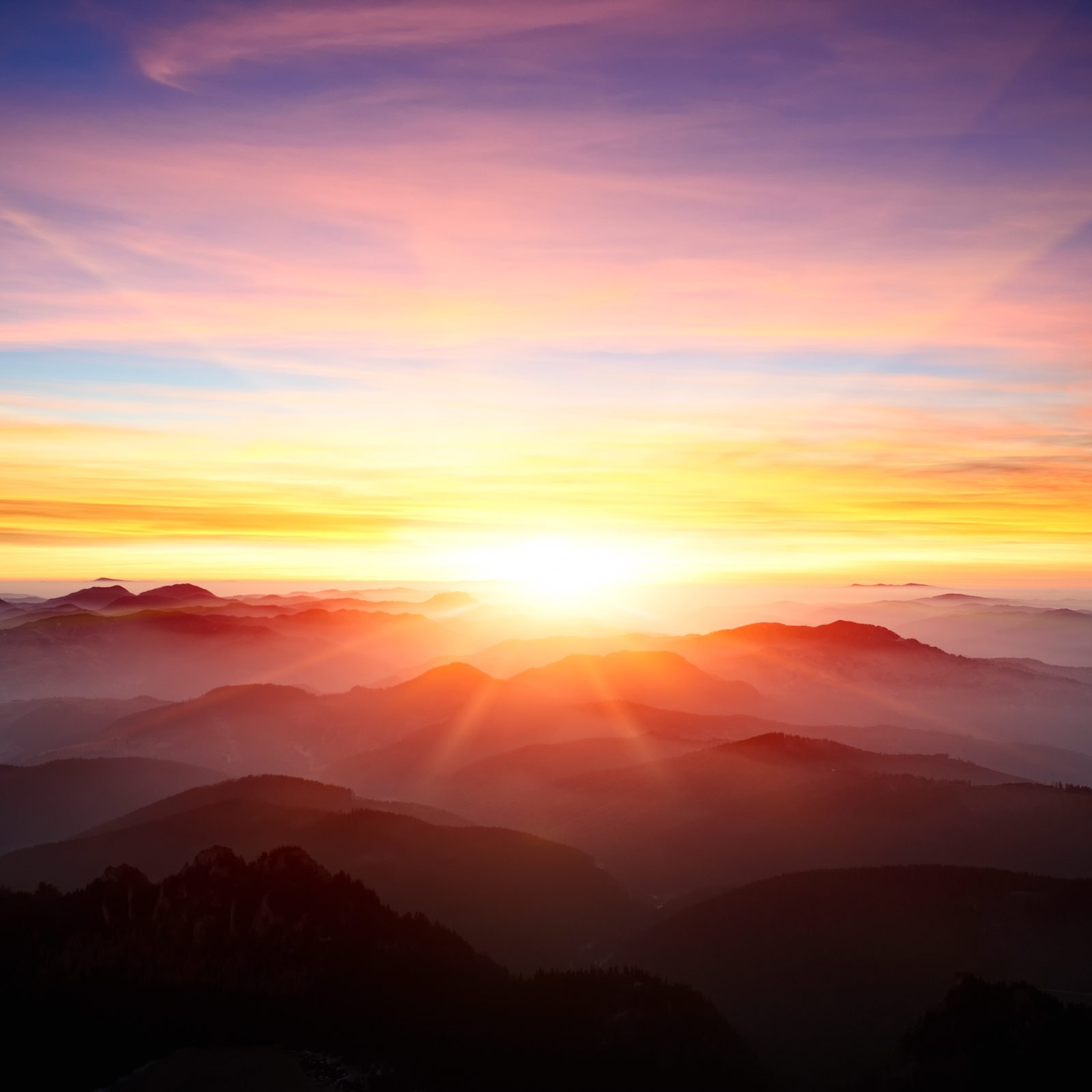 majestic sunrise with clouds and mountains|