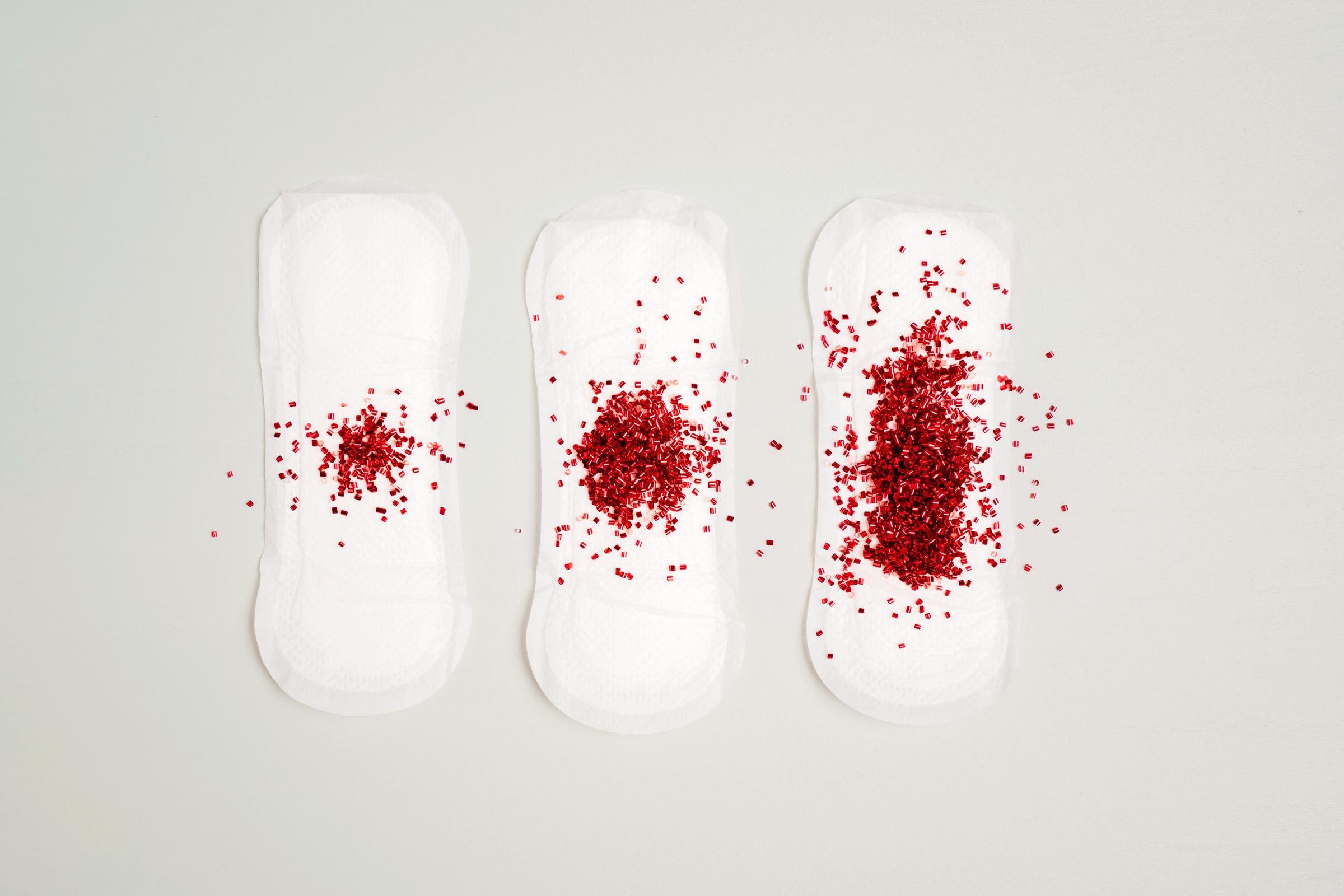 Menstruation sanitary napkin glitter concept