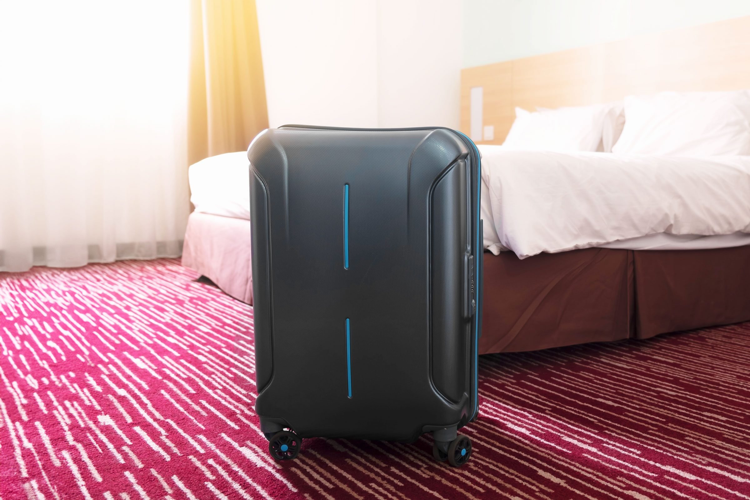 Here’s Why You Should Put Luggage in Your Hotel Room’s Bathtub, According to Experts