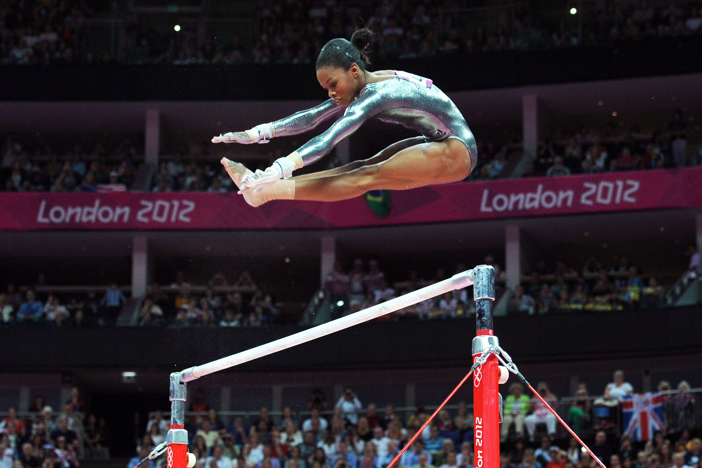 Gabrielle Douglas competes during the Artistic Gymnastics women's uneven bars final at the North Greenwich Arena, London