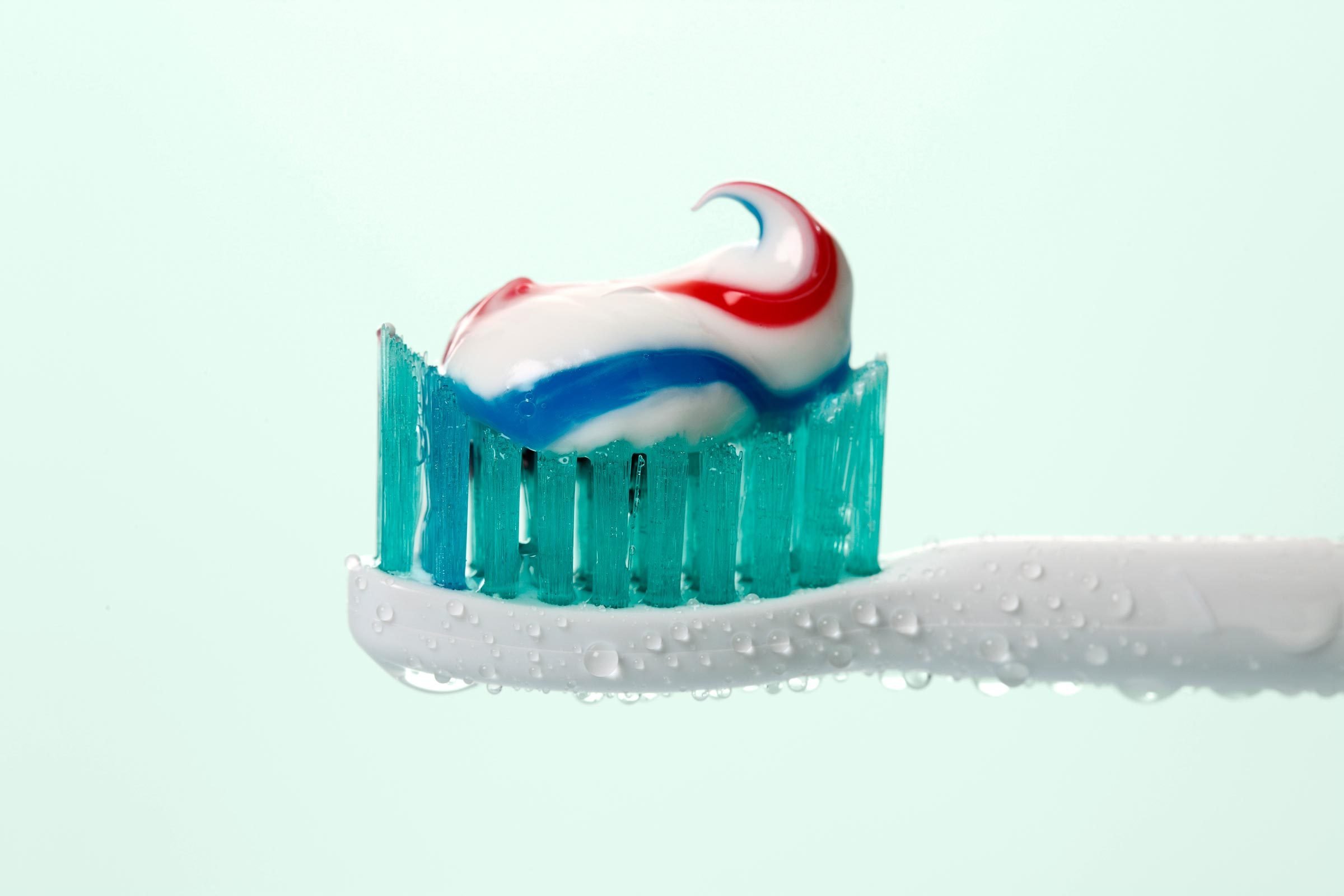 Here's What Happens If You Don't Brush Your Teeth, According to a Dentist