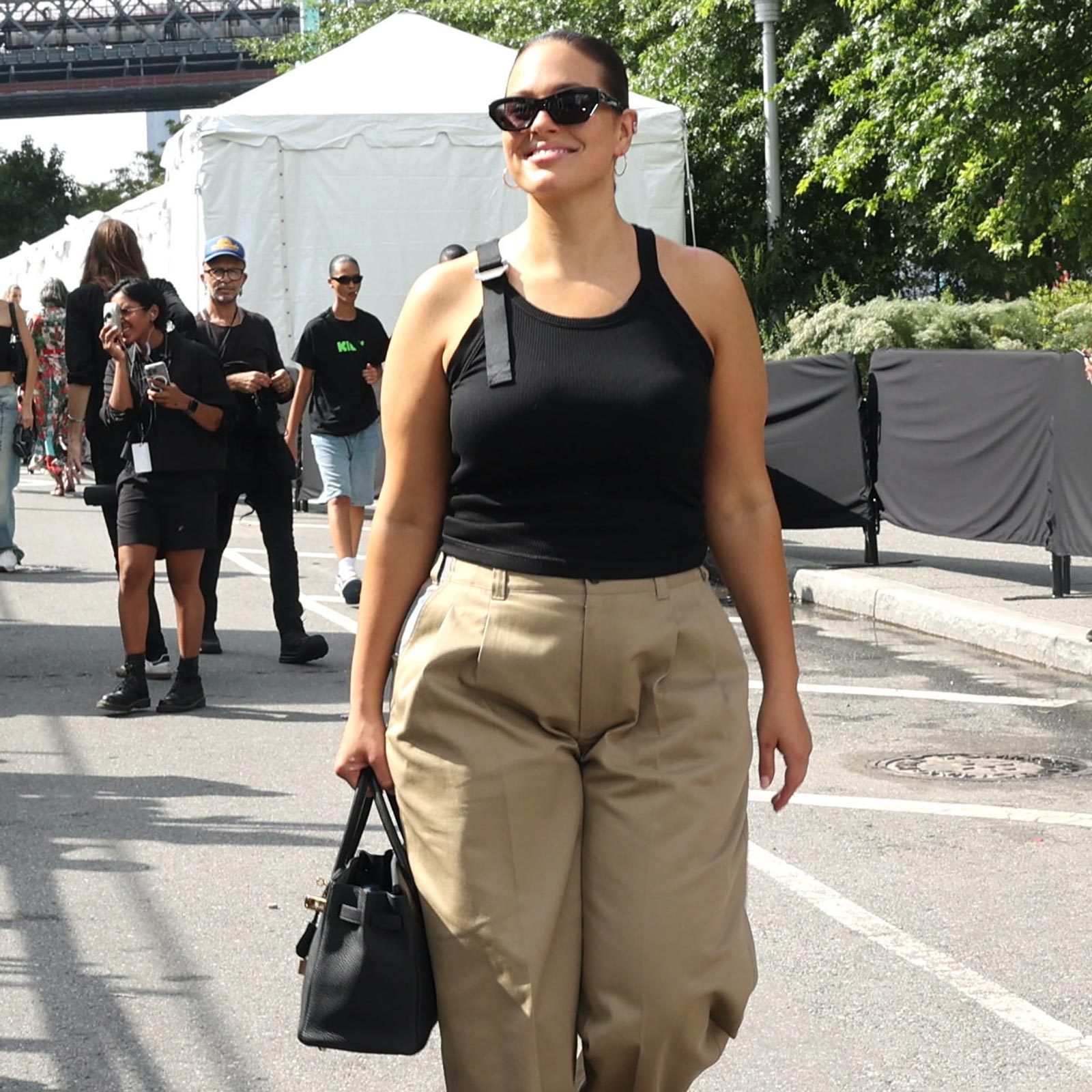 Ashley Graham is seen at the Michael Kors Collection 2024 Runway Show at Domino Park in Brooklyn on September 11, 2023