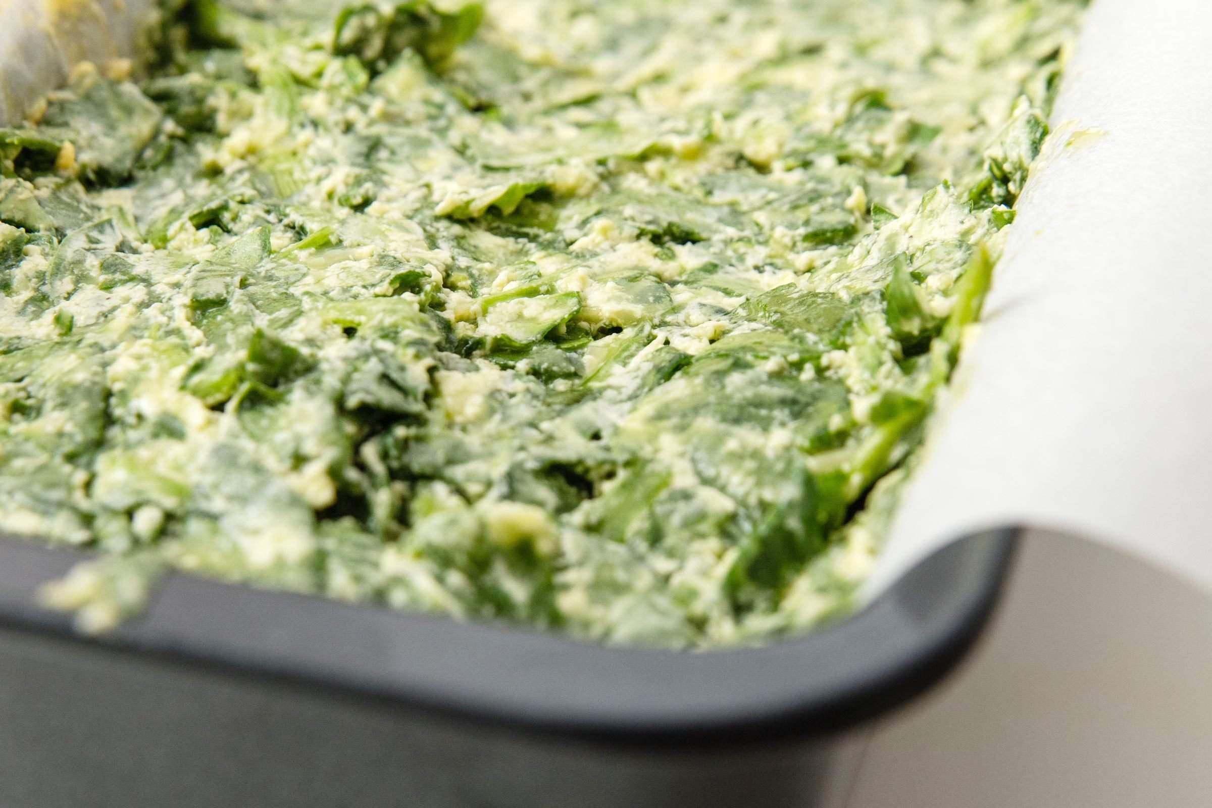green spinach cake in a pan