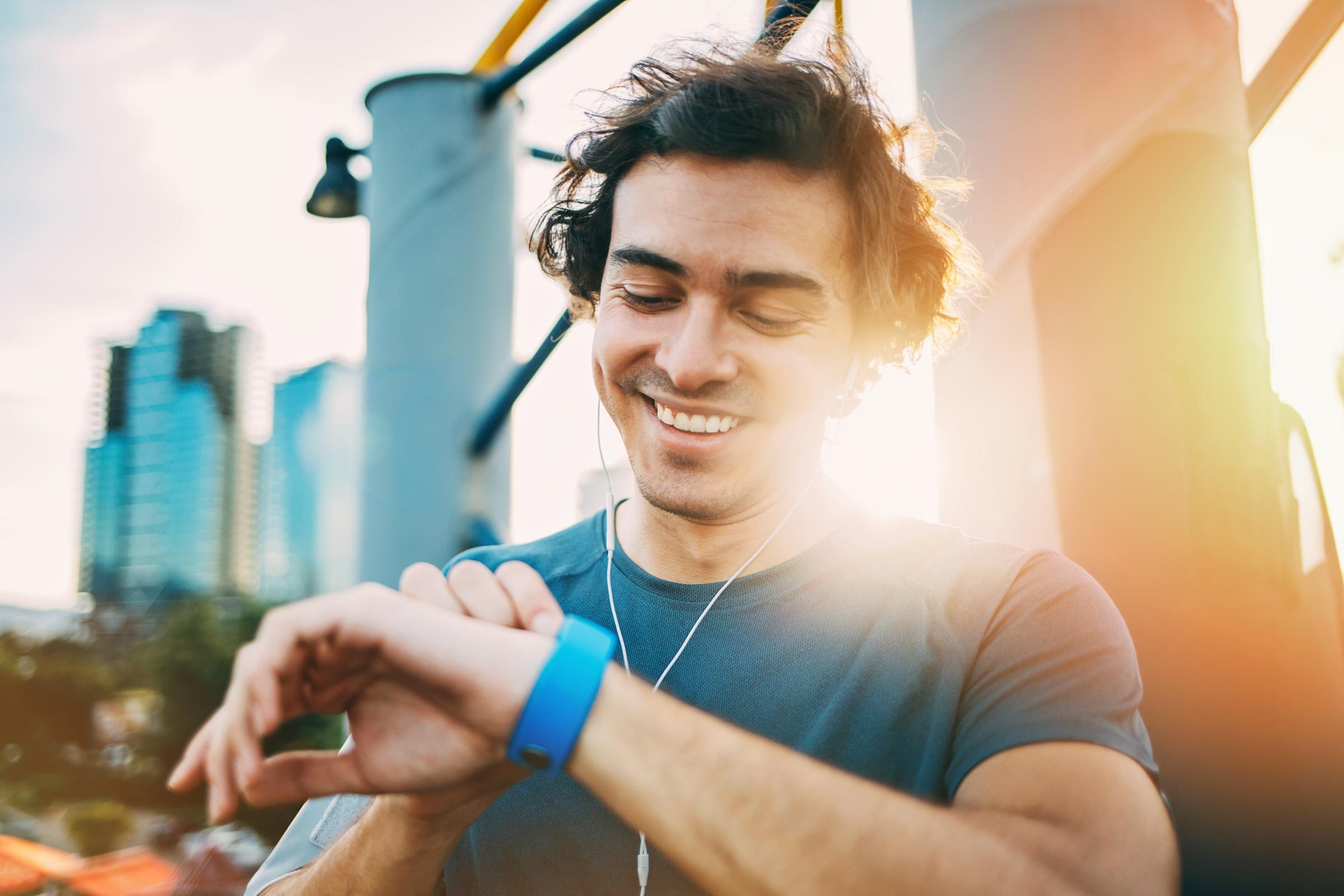 man on a run checking his apple watch