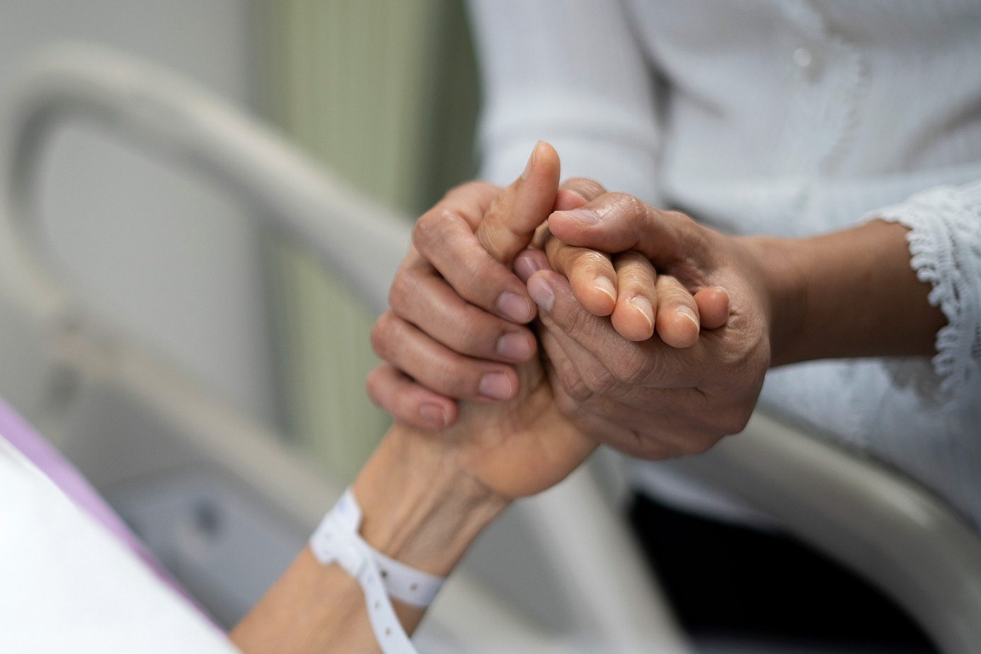 Shot of daughter encourage her mother and holding the mother's hand to sleep on the bed ?in hospital.|Jackie Duda May 22 2021.jpg